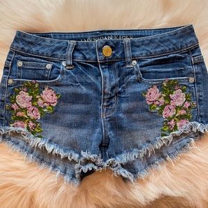 American Eagle cutoffs with embroidered flowers